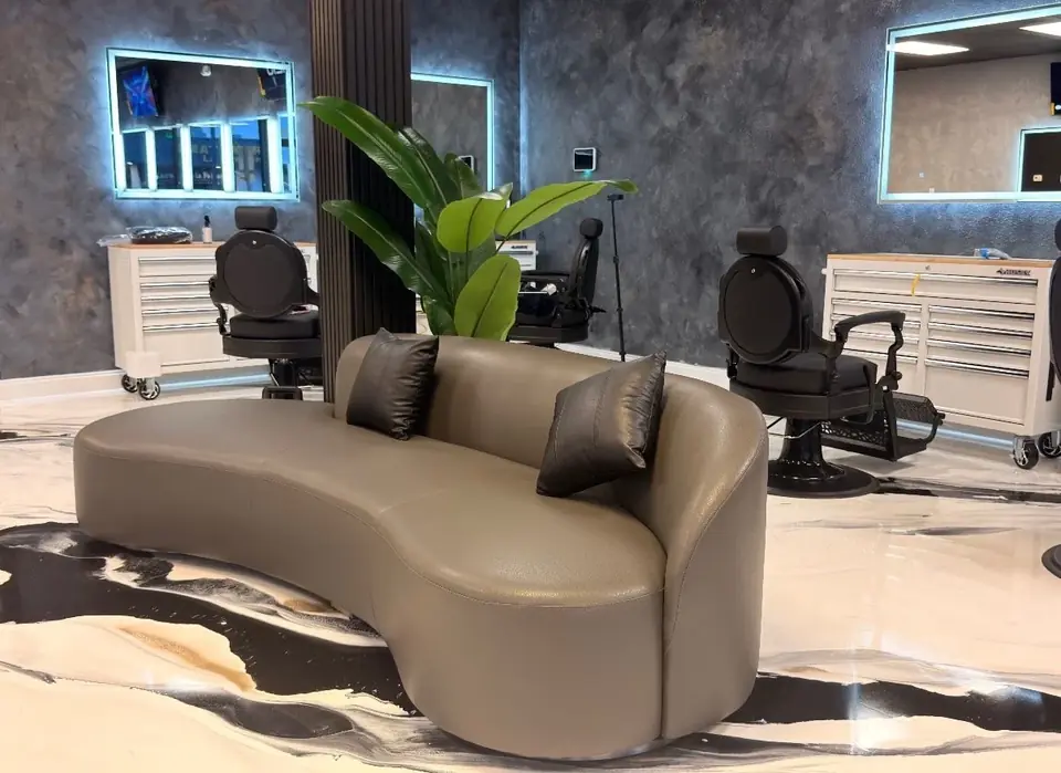 Lounge sofa placed in a finished barbershop