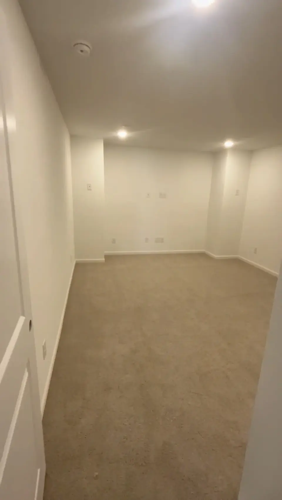 Before: empty carpeted bonus room